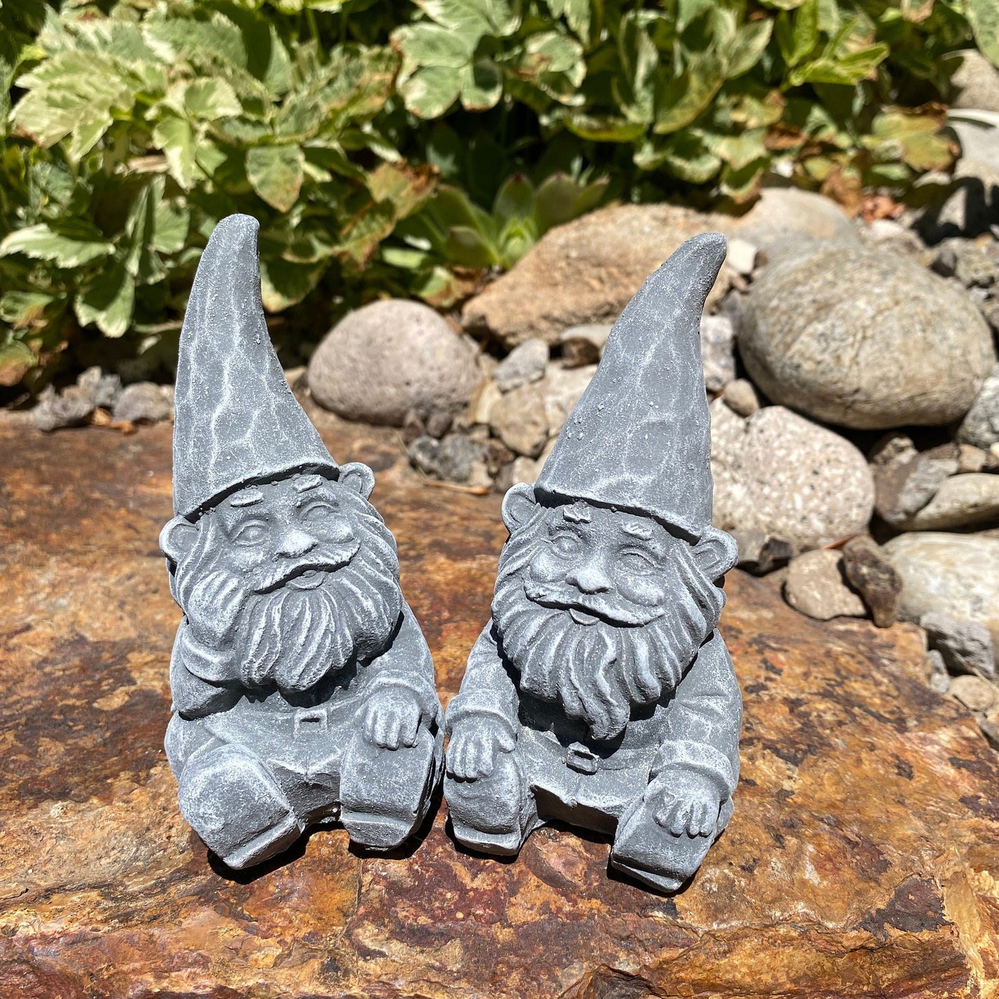 Handmade concrete garden gnome pair, perfect for outdoor decor. Cement gnome statues for yard, patio, or garden decoration